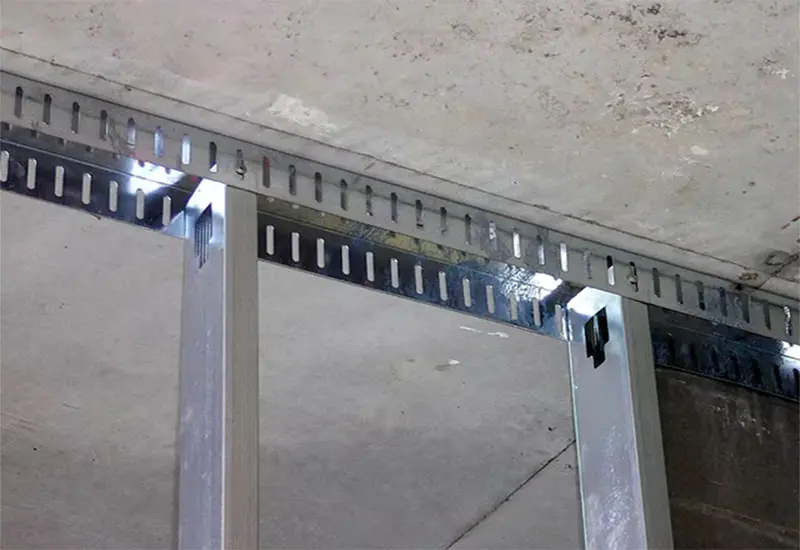 Slotted Deflection Track